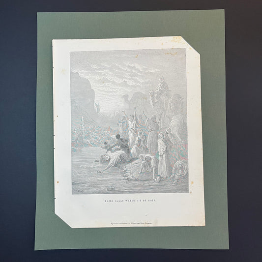 Mozes slaat water uit de rots. Originele houtgravure van Gustave Doré uit 1875.