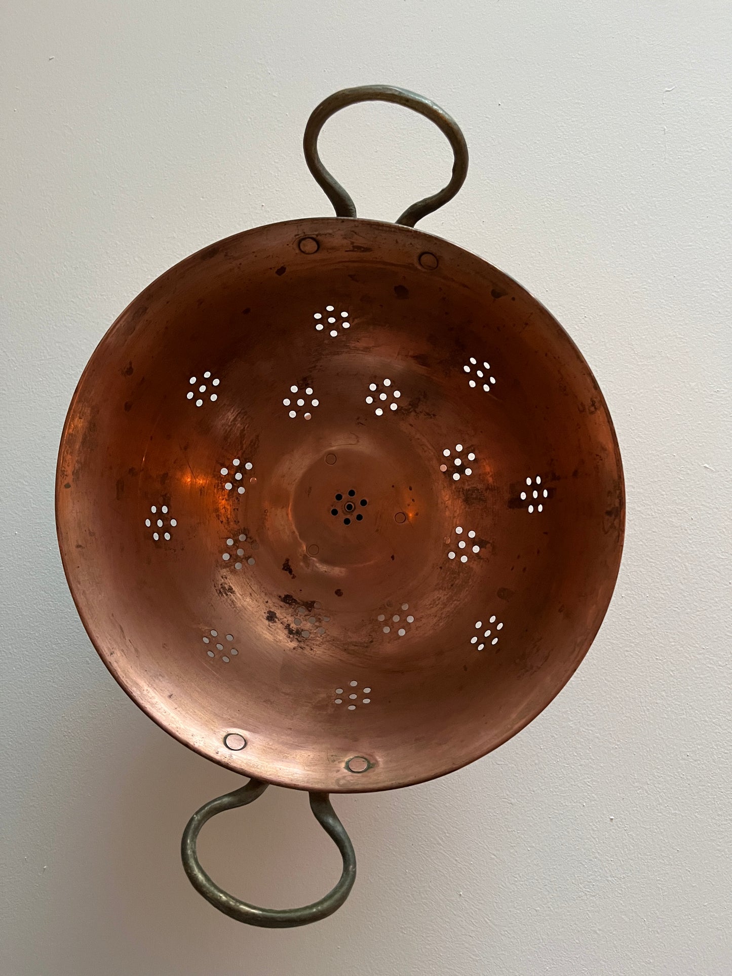 Antique copper colander