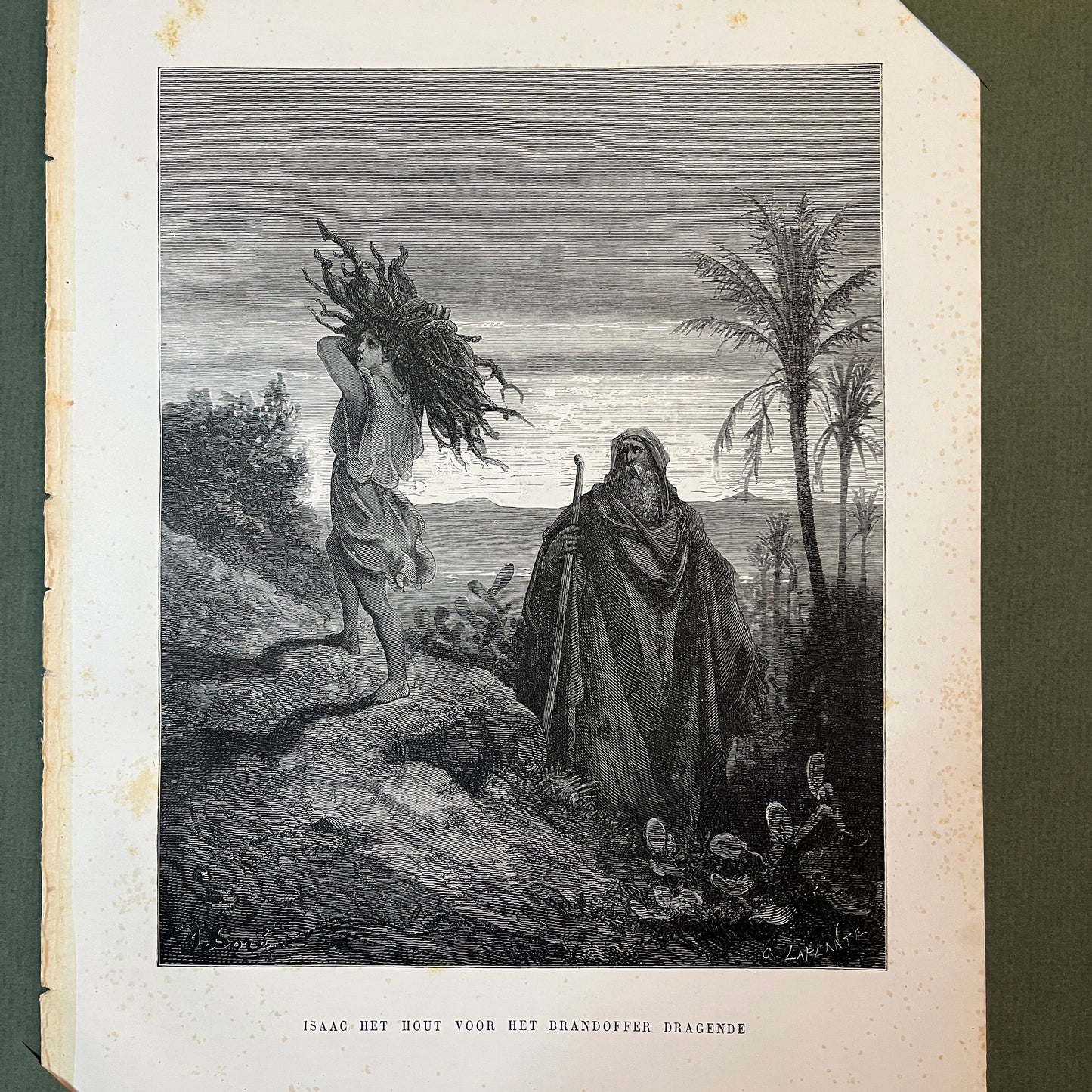 Isaac carrying the wood for the burnt offering. Original wood engraving by Gustave Doré from 1875.