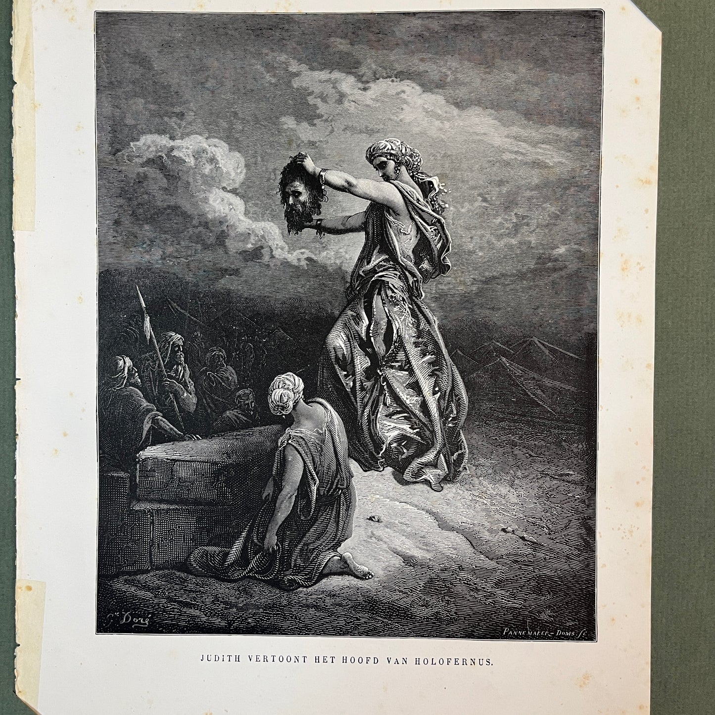 Judith shows the head of Holofernus. Original wood engraving by Gustave Doré from 1875.