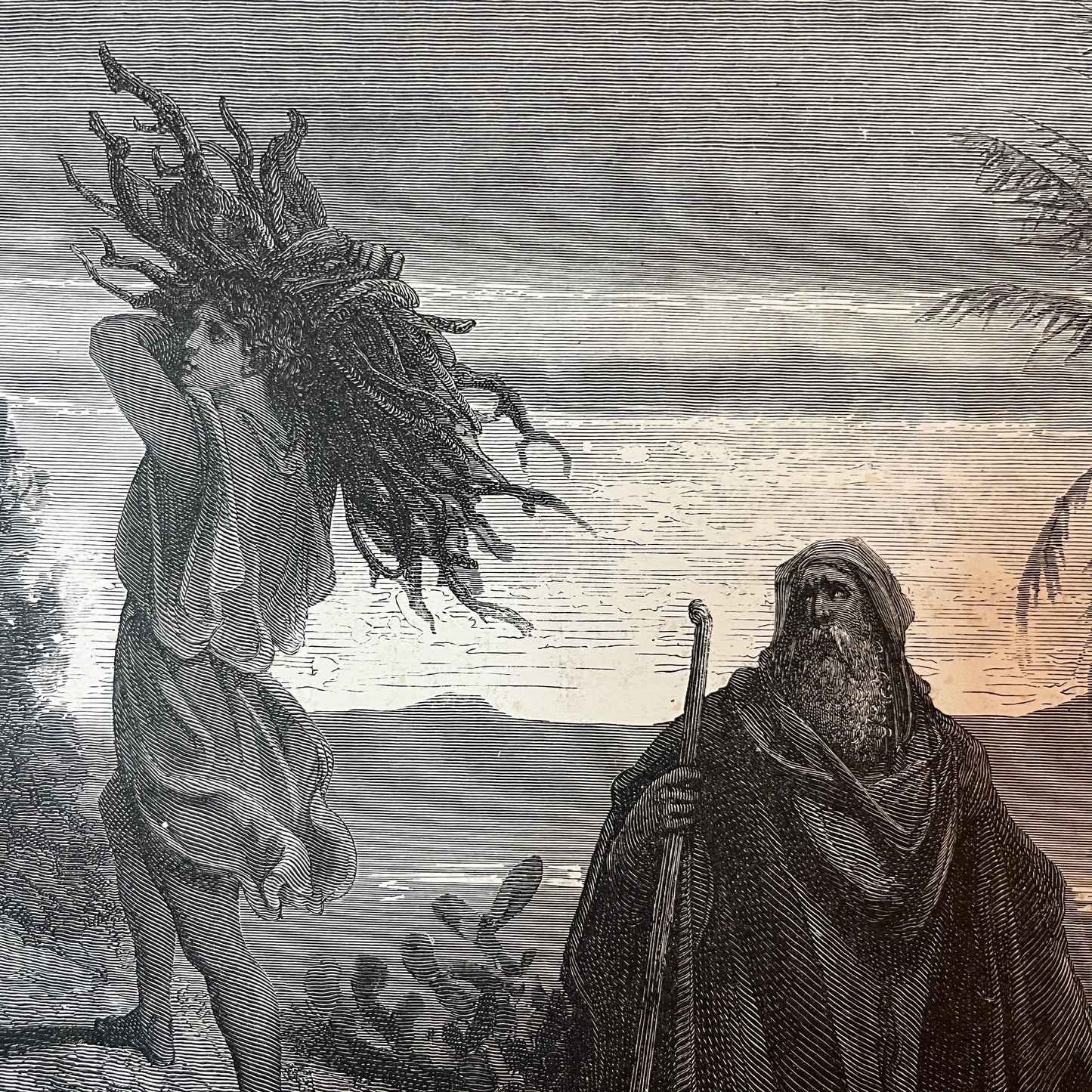 Isaac carrying the wood for the burnt offering. Original wood engraving by Gustave Doré from 1875.