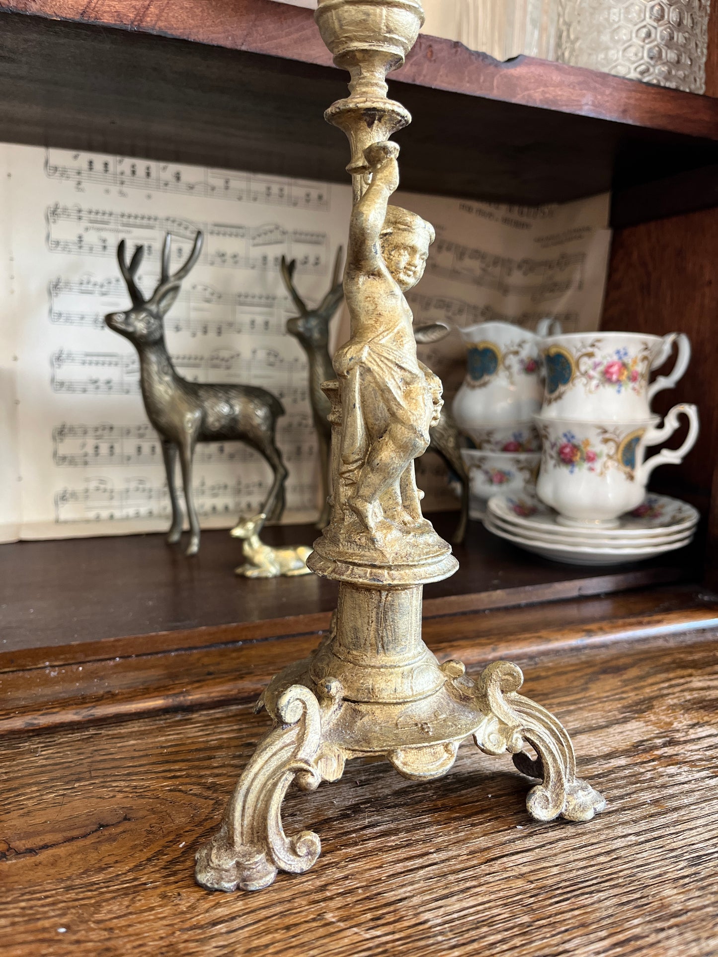 Antique candlestick figure