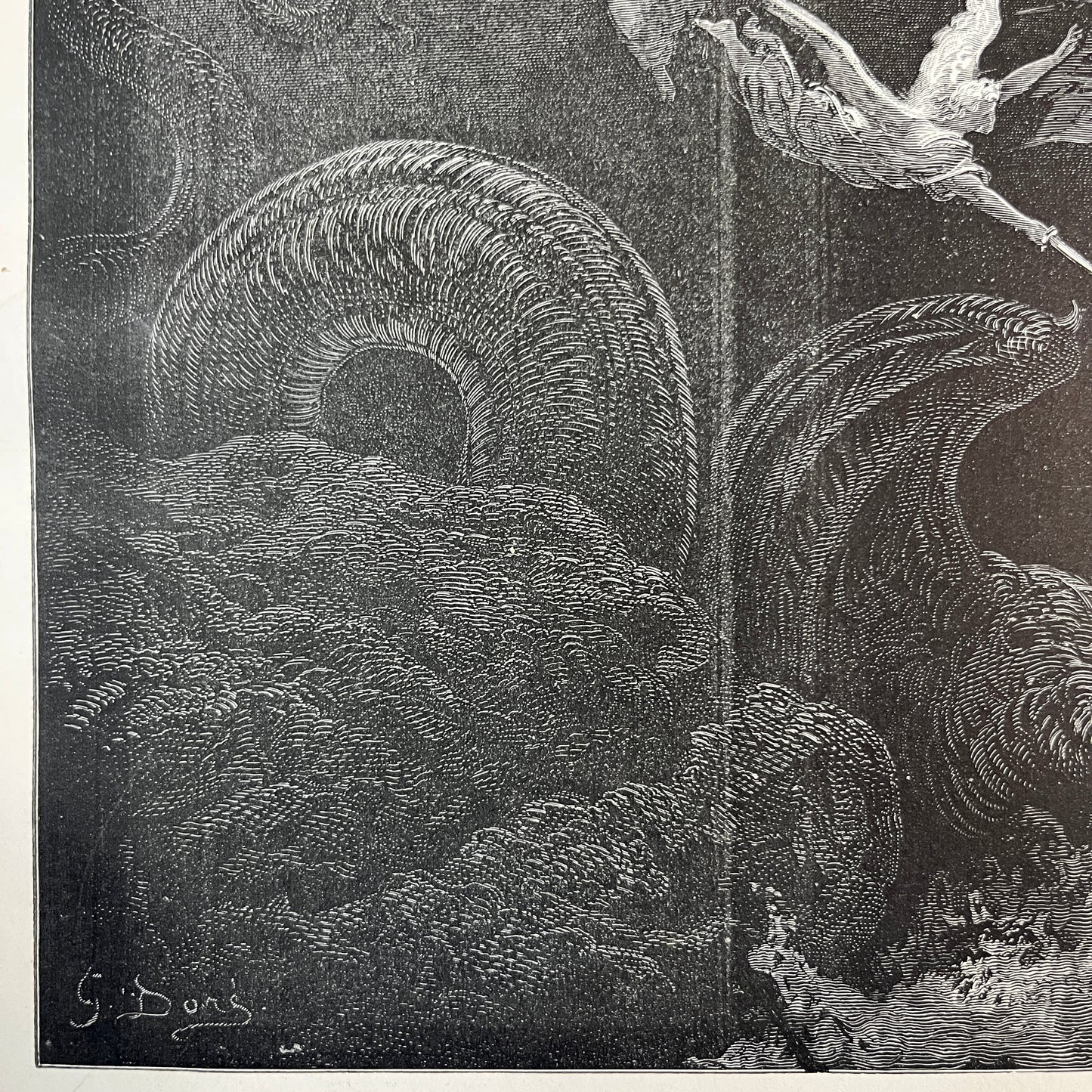 Michael and his angels fighting the dragon. Original wood engraving by Gustave Doré from 1875.